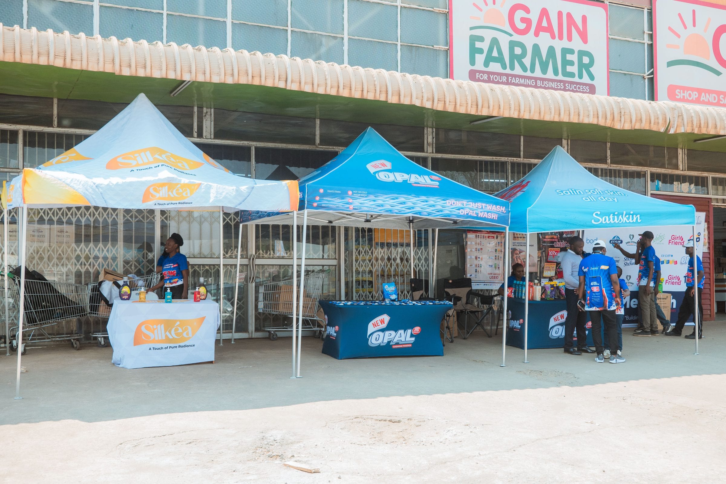 Branded activation gazebos outside a retail store